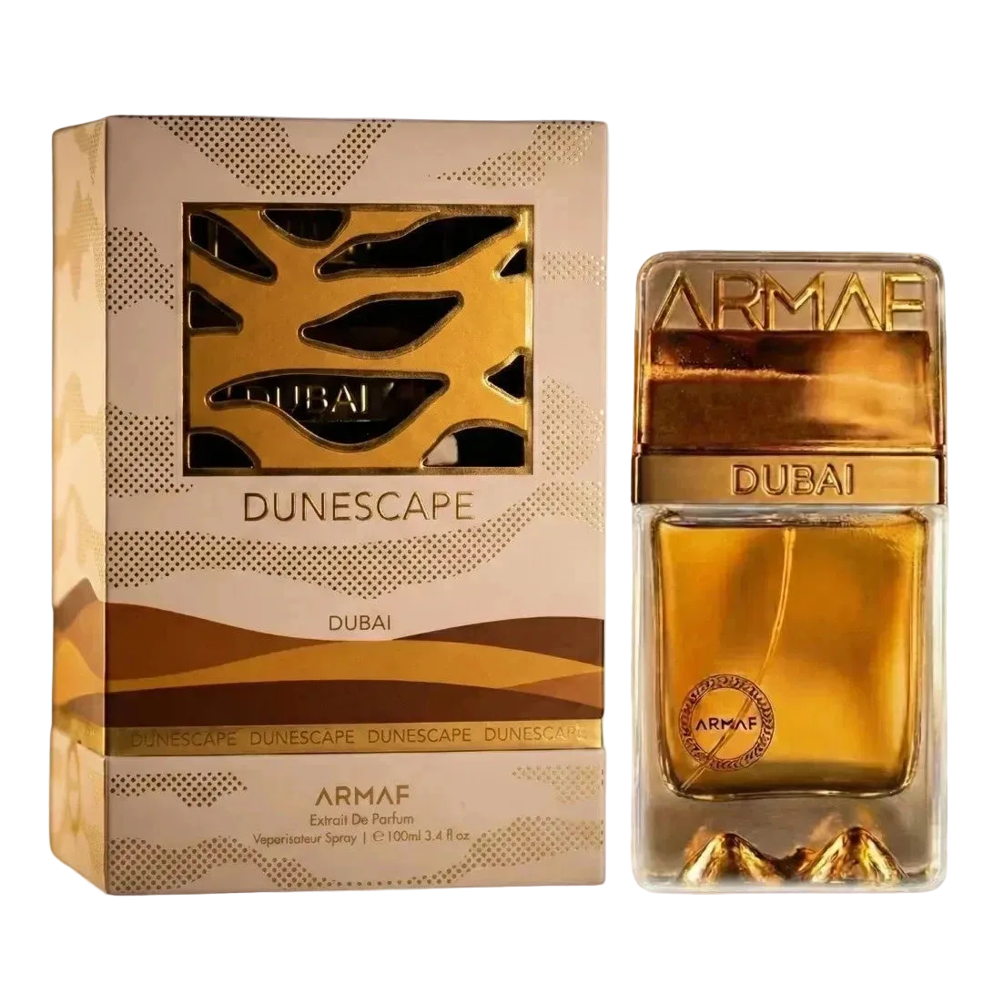 Armaf Dunescape Dubai perfume bottle and box. The box is beige with gold accents and a cutout revealing the bottle.