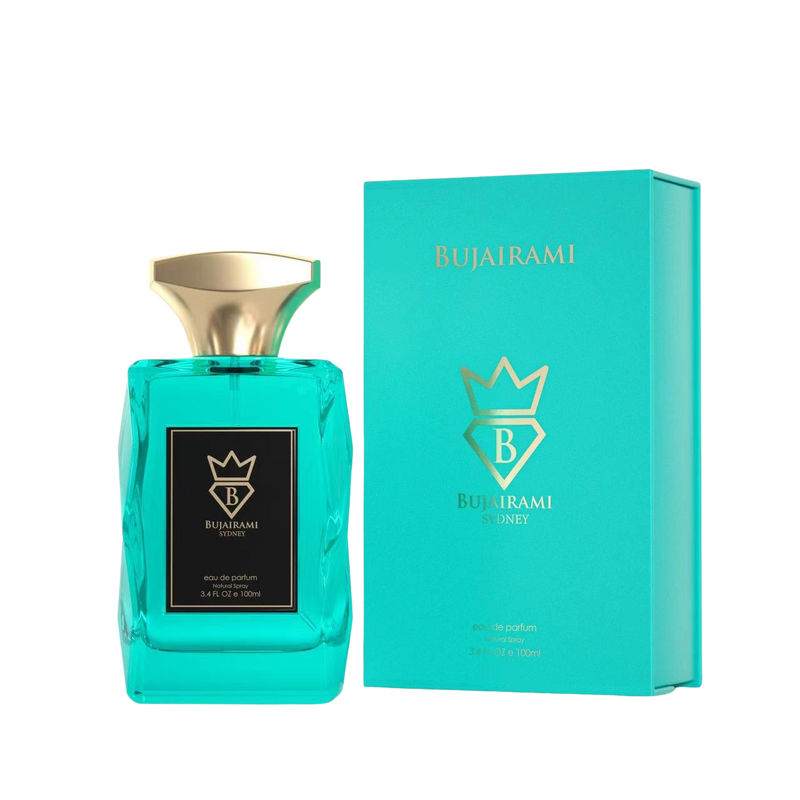 A turquoise perfume bottle and box with gold accents and the brand name Bujairami.