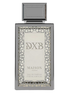 Maison Asrar DXB Eau de Parfum bottle with a silver cap and intricate patterned frame.