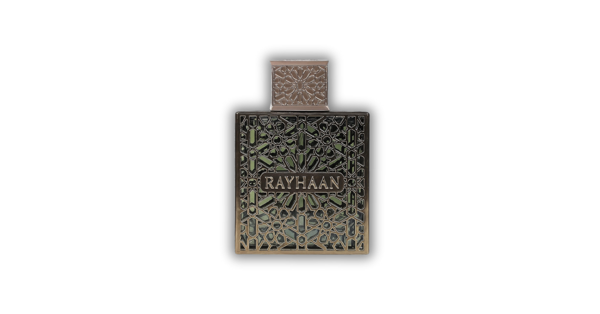 Rayhaan Terra EDP decant bottle with intricate geometric metal overlay and silver cap.
